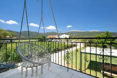 Image de Studio 'Rosegarden Charme D'antan' avec terrasse partagée, Wi-Fi et climatisation