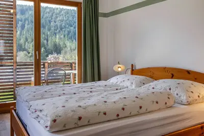 Image de Appartement 'Silbernagl Direkter Blick Zum See' avec vue sur le lac, terrasse partagée et Wi-Fi