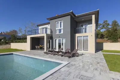 Image de Maison de vacances Villa avec piscine et barbecue