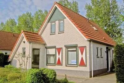 Type Zeemeeuw  located at the Schoneveld holiday park  is a tough holiday home with great comfort (87 m2). Around the House there is a garden with driveway for the car.