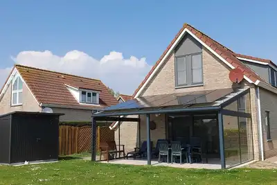 Want a pleasant holiday in an eco-friendly and energy-efficient home with all modern comforts. Features include :- car charging station on private driveway so you don't have to move.