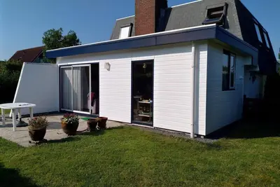 Schoneveld 59 of type Starfish located on holiday park Schoneveld near Breskens is an attractive and comfortable semi-detached house offering plenty of privacy and with a spacious terrace and garden.