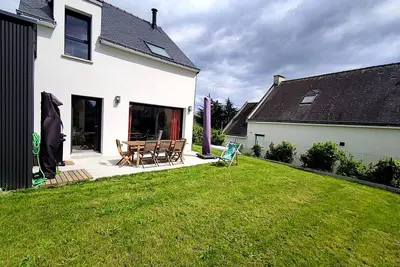 Image de Maison cosy 8 pers. à 450m de la plage, grand jardin, proche commerces et port de Saint-Jacques.