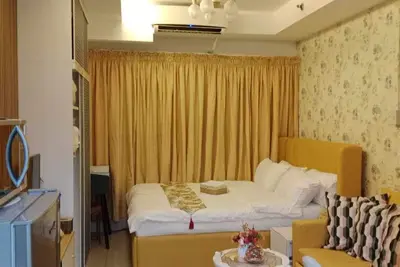 Image de 15 min drive to Airport & walking distance to Mall of Asia Condominium