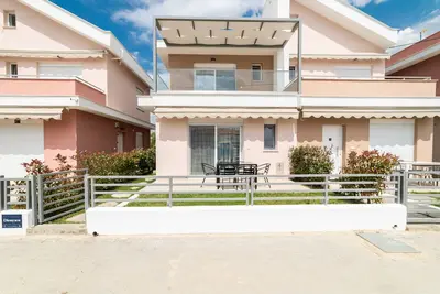 Image de Dionysos- Two-Bedroom Duplex with Garden