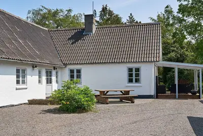 Image de Maison de vacances pour 14 a Rønne-By Traum