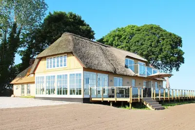 Image de Maison de vacances pour 14 a Havndal-By Traum