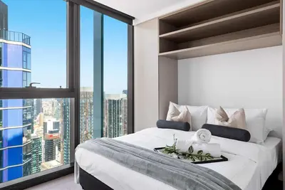 Image de A Cozy & Comfy 2br Apt Up in the Clouds Near Cbd