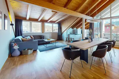 Image de Exclusive vacation apartment above the city center, with great mountain views