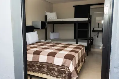 Image de Suíte Familiar Praia Indaiá - 03 Caraguatatuba