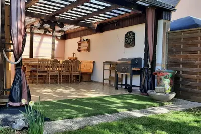 Image de Maison de vacances 'Haus Am Ring' avec terrasse privée, jardin privé et Wi-Fi