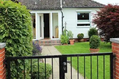 Image de Bungalow 'Ferienhaus Seaside' avec terrasse privée, jardin privé et Wi-Fi