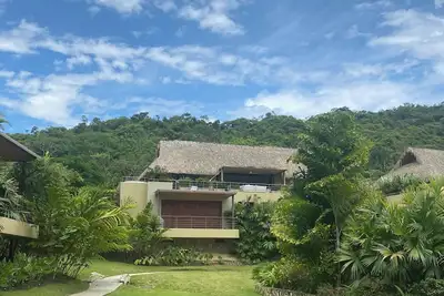 Image de The Multivilla is inside the exclusive Mesa de Yeguas Golf country club.