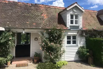 Image de Maison de vacances 'Gästehaus Altes Forstamt Sinntal' avec vue sur les montagnes, terrasse et Wi-Fi
