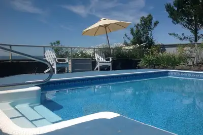 Image de Stunning beach house with pool and hot tub. Pet friendly! Great for families!