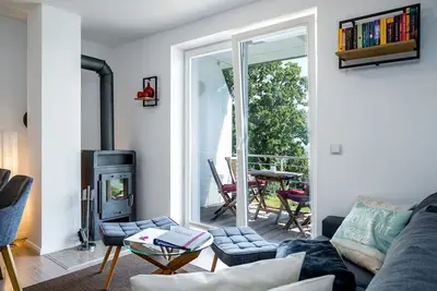 Image de Villa Nause Og4 - Meerblick, Sauna, Whirlpool, Kamin - Ferienwohnung - Og 4