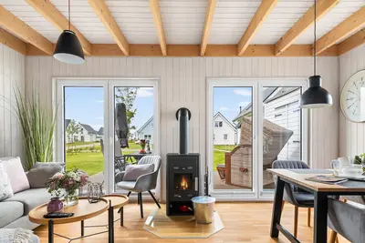 Image de Olpenitz Perle - Lillesand - Infrarot-sauna, Kamin, Dusche, Terrasse, Strandkorb