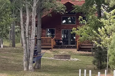 Image de Cozy lake-front home on crystal clear, all sports Long Lake in Hillman, Mi.