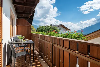 Image de Appartement 'Dorfblick' avec vue sur les montagnes, jardin partagé et Wi-Fi