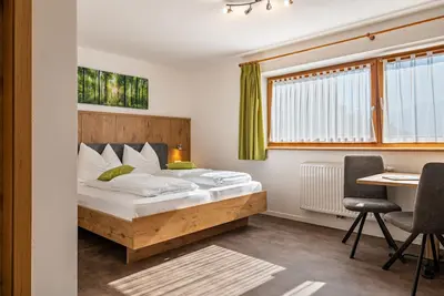 Appartement \"Alpennest\" avec vue sur les montagnes, jardin partagé et Wi-Fi