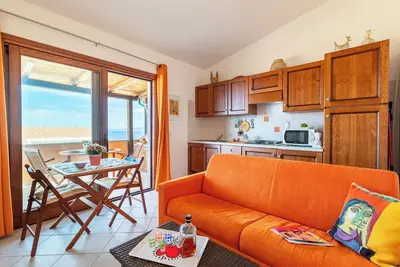 Image de Appartement 'Bella Vista Castelsardo' avec vue sur mer, balcon et climatisation