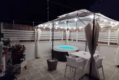 Image de Siramà Suite Deluxe, Suite de Luxe avec Jacuzzi et Bain Turc dans la chambre