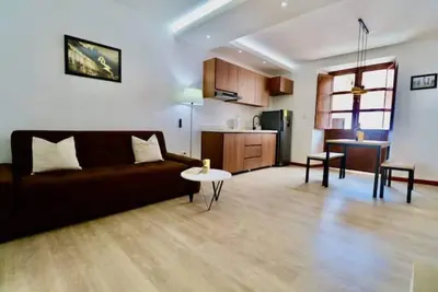 Image de Spacious Historic City Center Apartment + Views Parque Caldas + Workspace