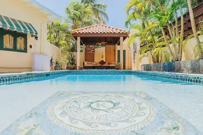Image de Paradise Garden – Pool, Garden, Wifi, 4br. The Perfect Retreat Near Beaches