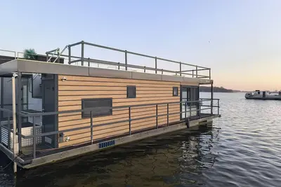 Image de Appartement de vacances \"Sur le lac\" avec vue sur le lac, terrasse commune et climatisation