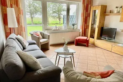 Image de Ferienwohnung Seehundsreich - Haus Schwalbennest