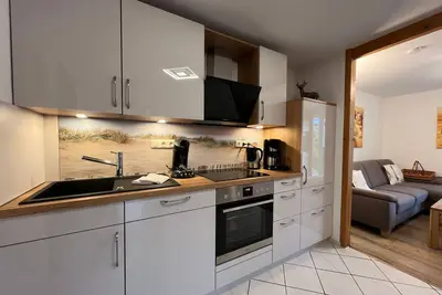 Image de Ferienwohnung Typ Langeoog - Ferienhaus Wieke - Eine Oase der Erholung