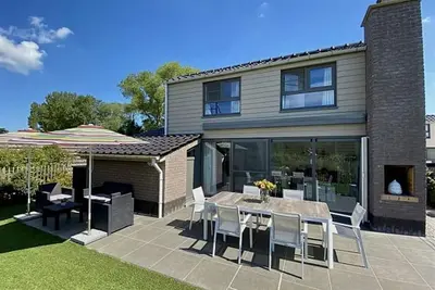 Leuke vakantiewoning avec tuin à Westende
