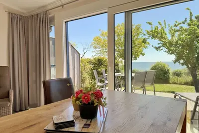 Image de Ferienwohnung 03 mit SĂĽdterrasse und Meerblick - P: Zollhaus Klein Zicker - Exklusive Wohnungen mit