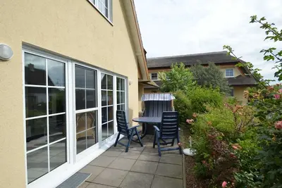 Image de Apartment Reethaus Boddenblick - reed house with terrace and beach chair, 1 bedroom, max. 4 persons