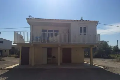 Image de Chalet cosy à 400m de la plage avec terrasse et parking - 2 chambres, 4 pers.