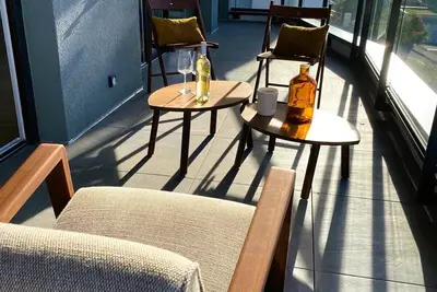 Image de Splendide appartement, neuf, terrasse, vue 180° lac, 5' du golf
