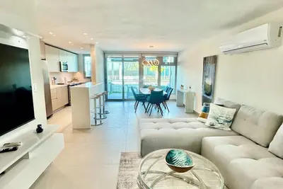 Image de New 3/2 Garden Apt. Full Backup Generator, 2 Pools, Near Beach, Gym, 2 Parkings.