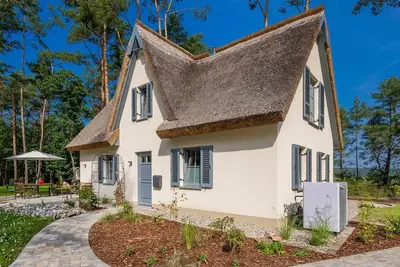 Image de Ferienhaus Auszeitfischer - Neu Errichtetes Ferienhaus in Ruhiger Wohngegend mit Parkplatz, Sauna