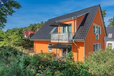 Image de Ferienhaus Abendrot Eg - Barrierefreie Traumwohnung mit Sauna in Loddin