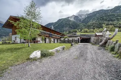 Image de Appartement \"Scheiberhof\" avec vue sur les montagnes, jardin privé et Wi-Fi
