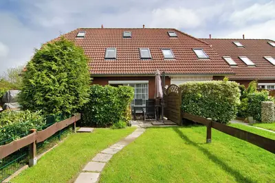 Image de Appartement de vacances 'Ferienhaus Deichblick Nessmersiel' avec terrasse privée, jardin privé et Wi-Fi