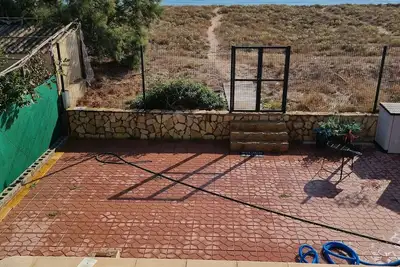 Chalet con Piscina y Salida Directa a Playa Virgen
