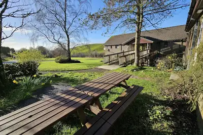 Image de Bunkhouse/20Bedroom/Sleeps85/4Acre/Gamesroom/Wifi