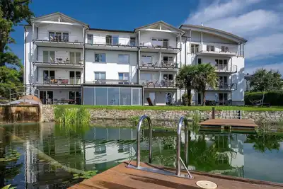 Image de Villa Nause Eg3 - Meerblick, Sauna, Whirlpool, Kamin - Ferienwohnung - Eg3