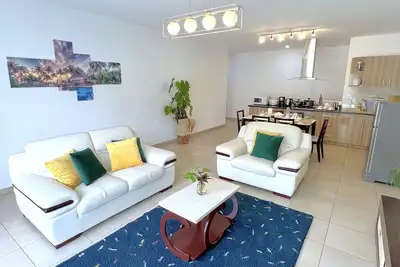 Image de Appartement spacieux avec jardin privé, calme et sécurisé idéal pour familles