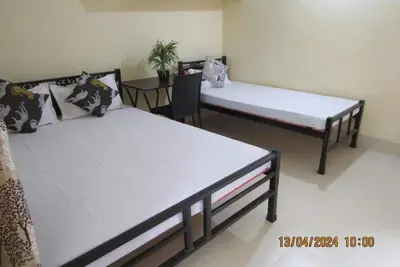 Image de Cozy Home offers a warm embrace to weary travelers seeking a home away from home