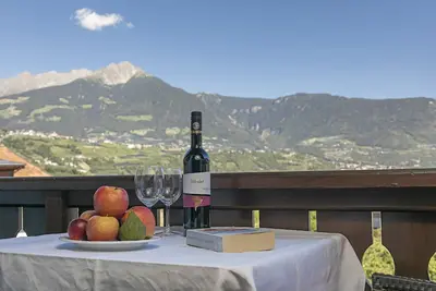 Image de Appartement 'Ifinger' avec vue sur les montagnes, jardin partagé et Wi-Fi