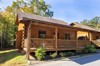 Image de Log Cabin Multi Lvl Queen Wilderness Presidential