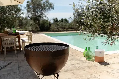 Image de Tenuta Lavati, three trulli with private pool in Santa Maria di Leuca.