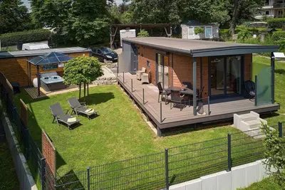 Image de GemĂĽtliches 4 Ferienhaus mit Whirlpool, Fitness, Infrarotsauna, Ebike, Alpakas